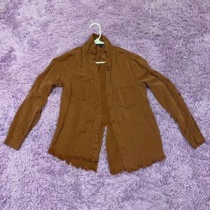 Light Brown shirt with slits in the back